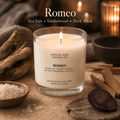 Romeo soy candle by Soulful Sage, lit with a full melt pool and styled with sea salt crystals, sandalwood, driftwood, and warm candlelight.